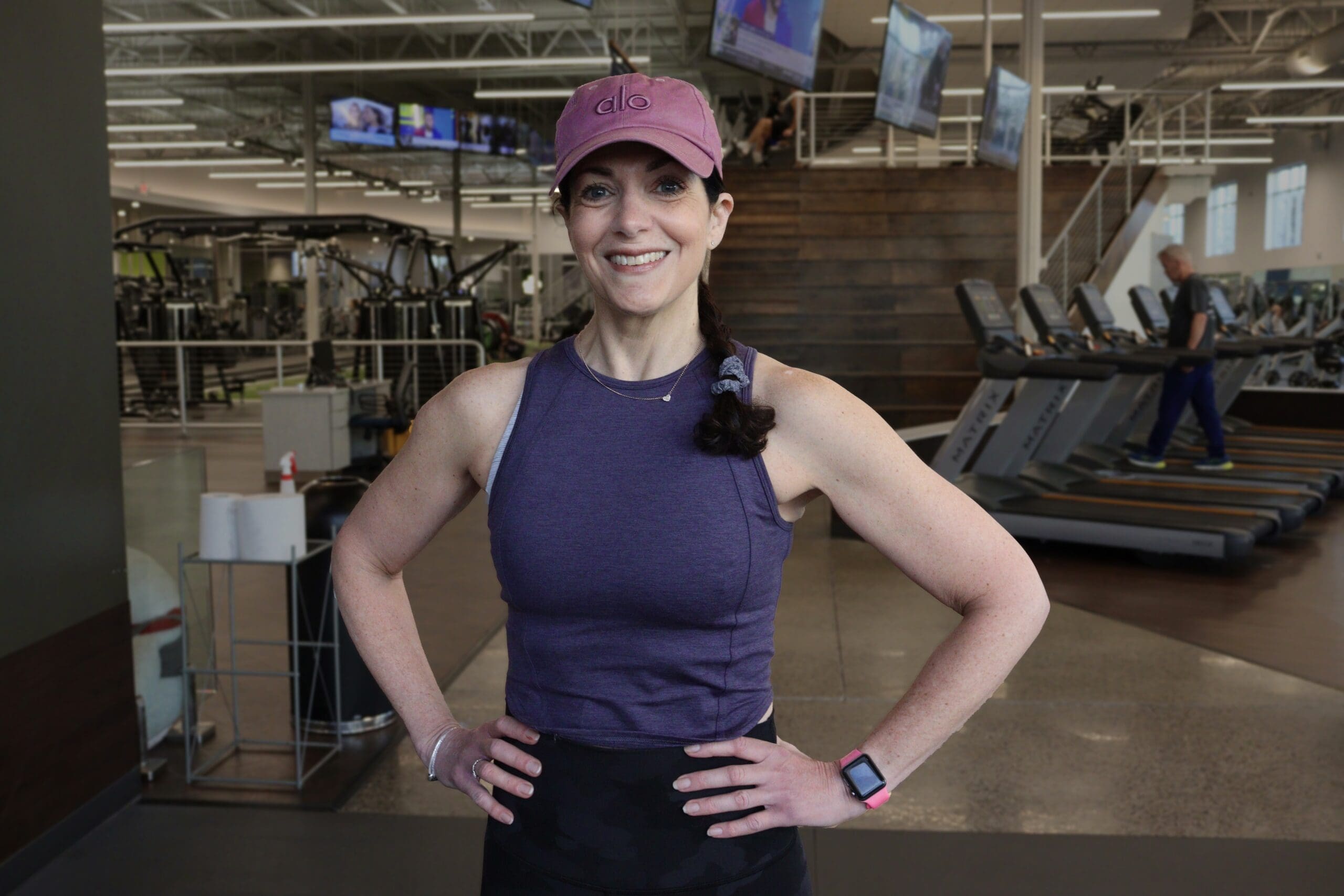 Member of the Month Susan Miller at Catalyst Fitness, showcasing her dedication to fitness through personal training, nutrition, and participation in group classes.